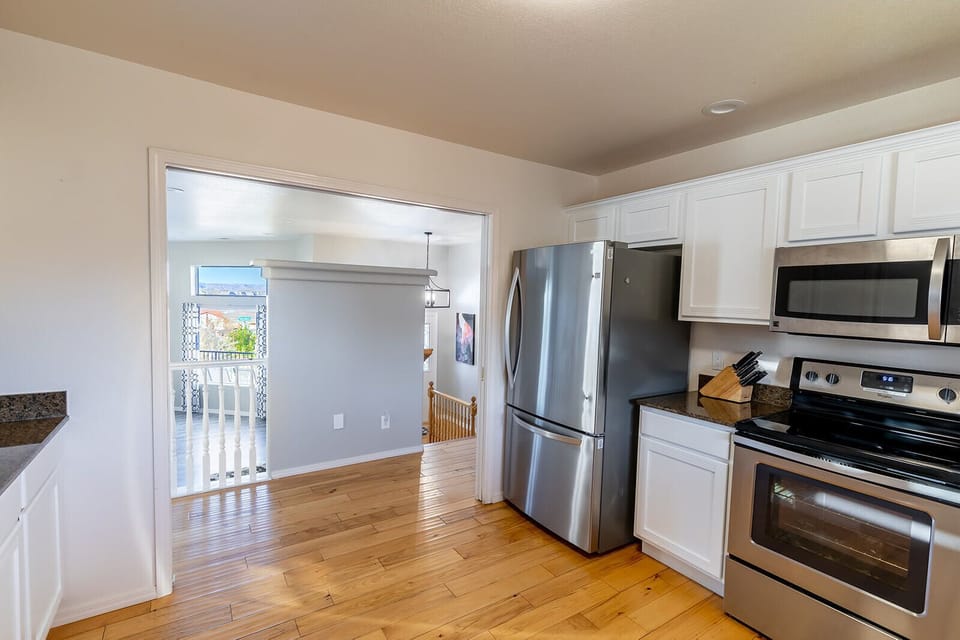 Large kitchen are with nice appliances.