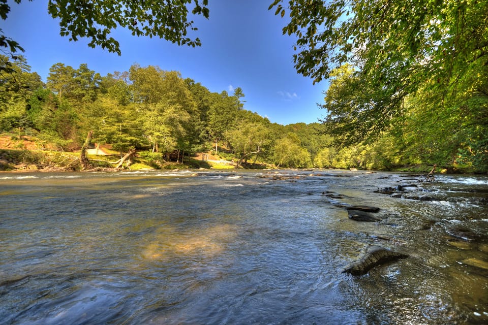 Noisy rapids in front of cabin.