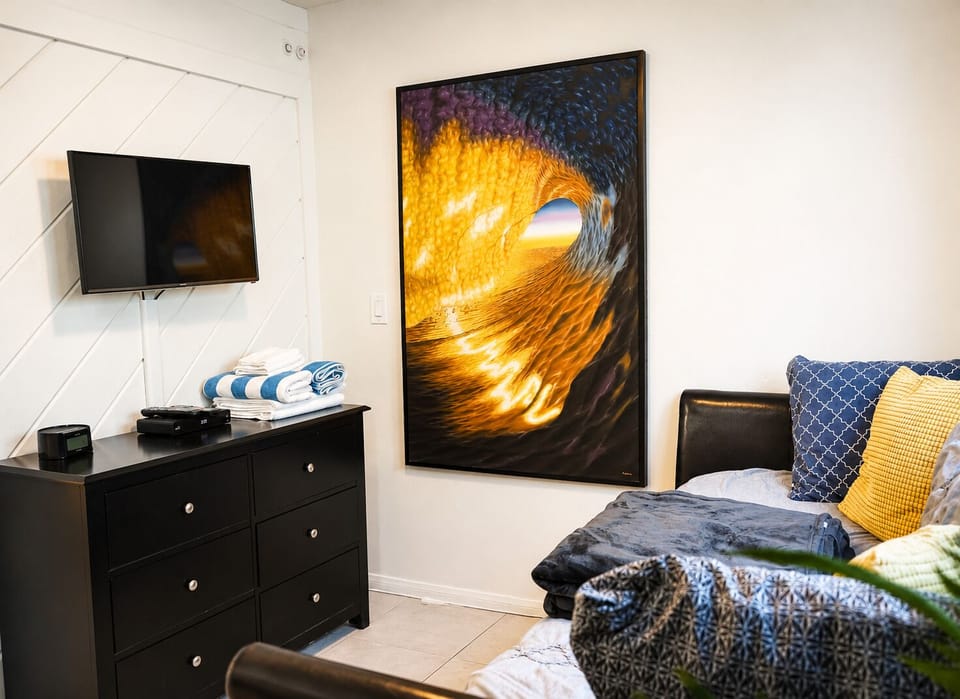 Small bedroom with twin bed/Couch, optional pull out twin, and 4k flatscreen.