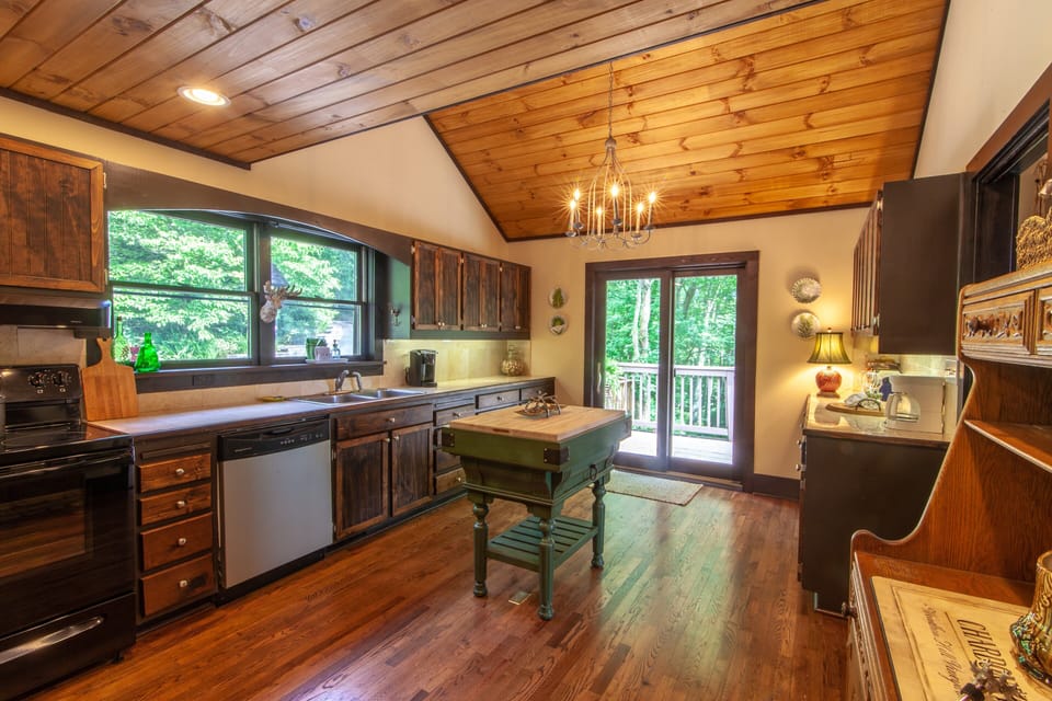 Vaulted Tongue-in-Groove ceilings and Hardwood Floors in the Kitchen
