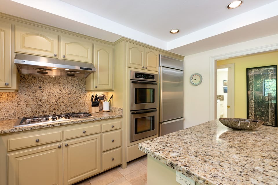 Gas stove and double ovens. 
