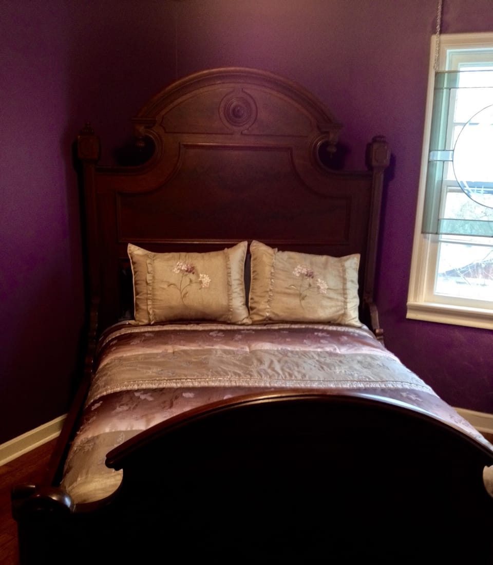 Centerpiece of Pegasus room - 200 year old solid wood burl walnut full size bed