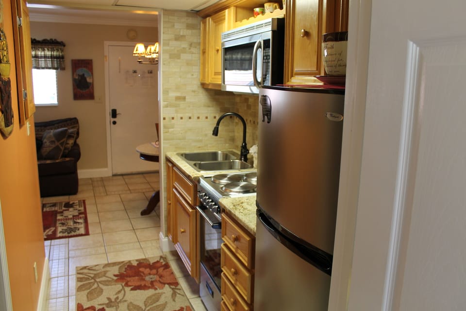 View through kitchen into sitting area.
