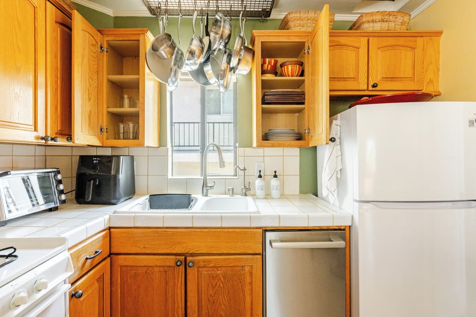 Kitchen sink includes Everpure water filter.  All cabinets are filled with a variety of plates, bowls, glasses, tupperware, pots and pans, blender, etc. Everything needed to cook a fabulous meal!