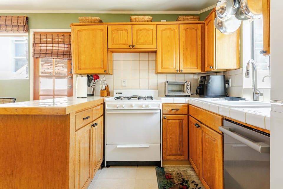 Kitchen includes all major appliances and fully stocked cabinets. There's also a built in water filter on the kitchen sink.