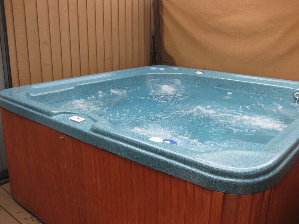Large hot tub on the deck