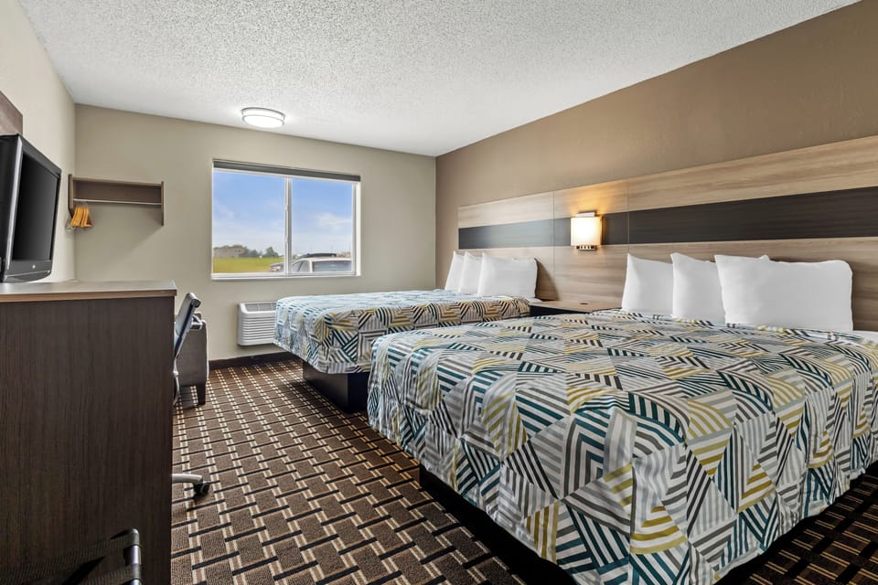 Deluxe Room, 2 Queen Beds, Non Smoking, Refrigerator & Microwave | Desk, laptop workspace, blackout drapes, free WiFi