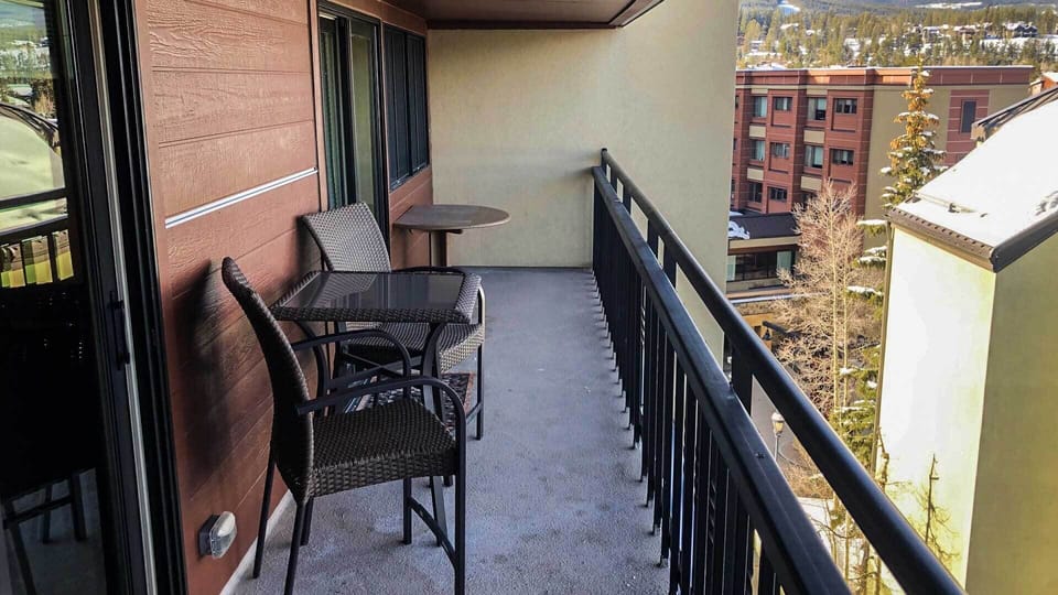 Private balcony with table and chairs