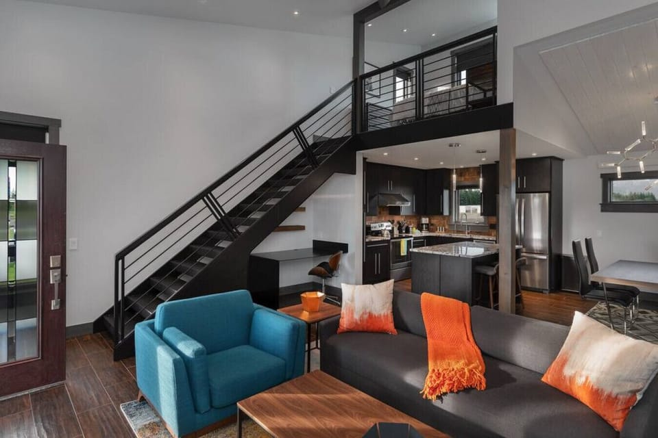 Living and loft with loft privacy shade up.