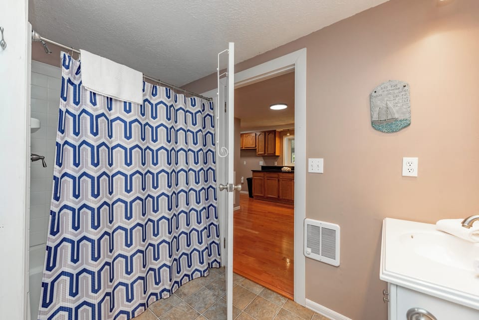 Shared Bath on Main Level and Laundry Area