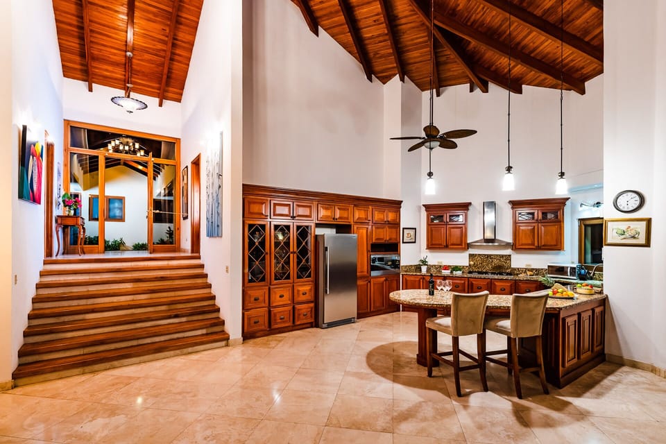 - entry way and main kitchen
(with doors to secondary and master bedroom)