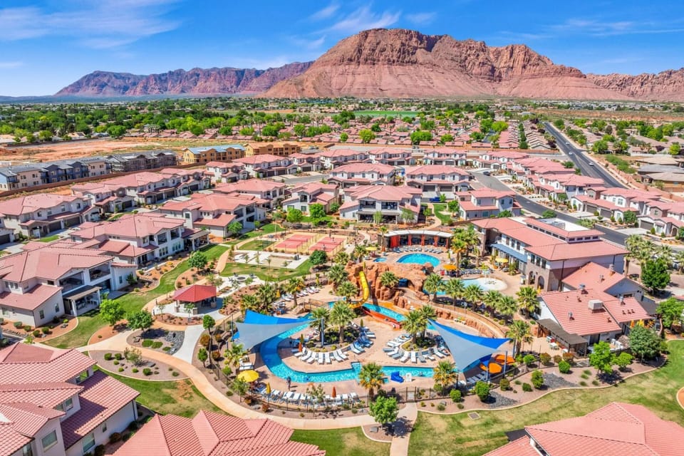 Enjoy the pool, water slide, lazy river, cornhole, and pickleball right off your patio