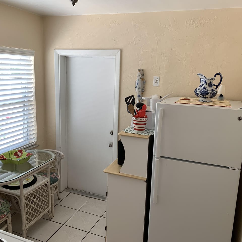 KITCHEN and EXIT DOOR TO PRIVATE MINI COURTYARD