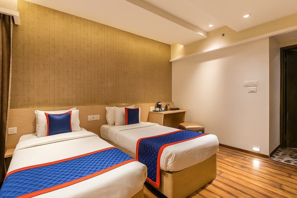 Superior Twin Room | Minibar, in-room safe, desk, blackout drapes