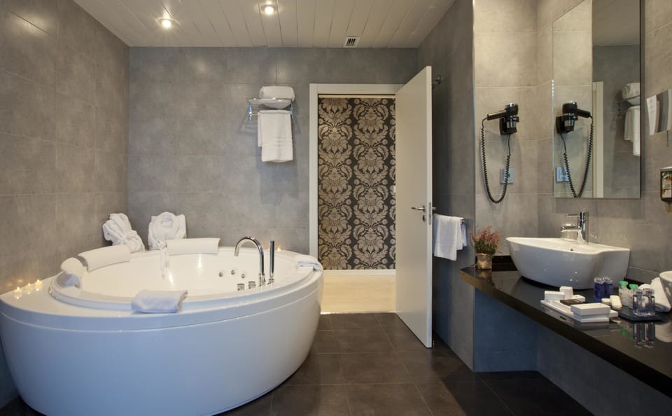 Suite, Jetted Tub | Bathroom | Hair dryer, bidet, towels