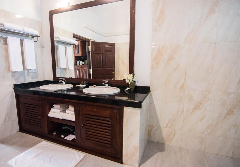 Shower, rainfall showerhead, designer toiletries, hair dryer