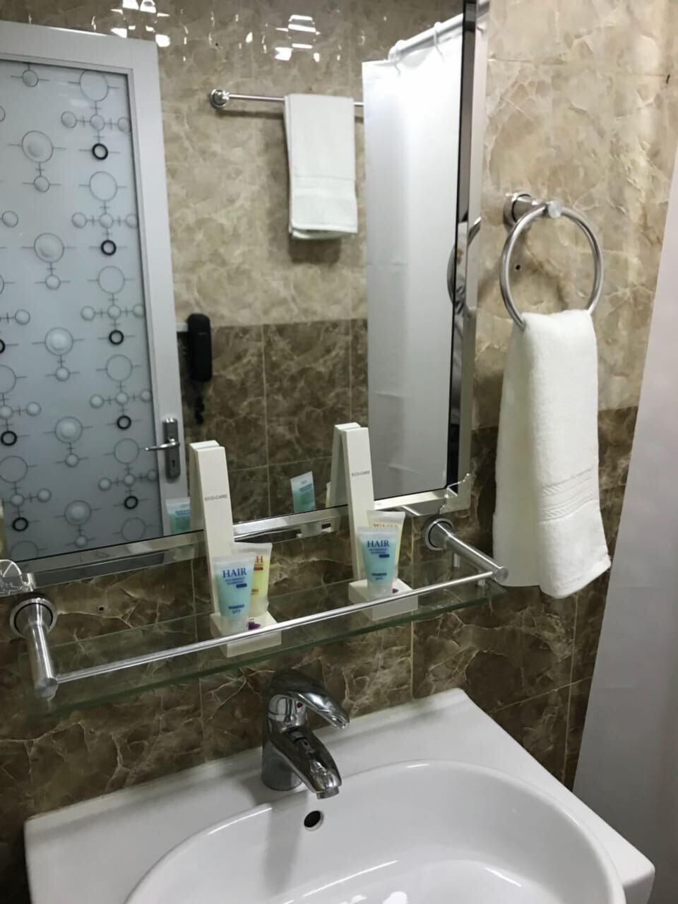 Shower, free toiletries, slippers, towels