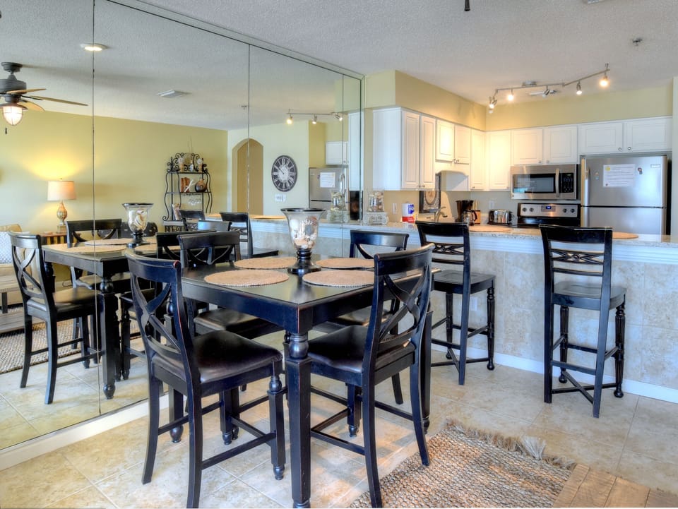 View of dining table and breakfast bar