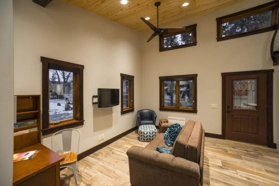 Living room with flat screen LED Smart TV.