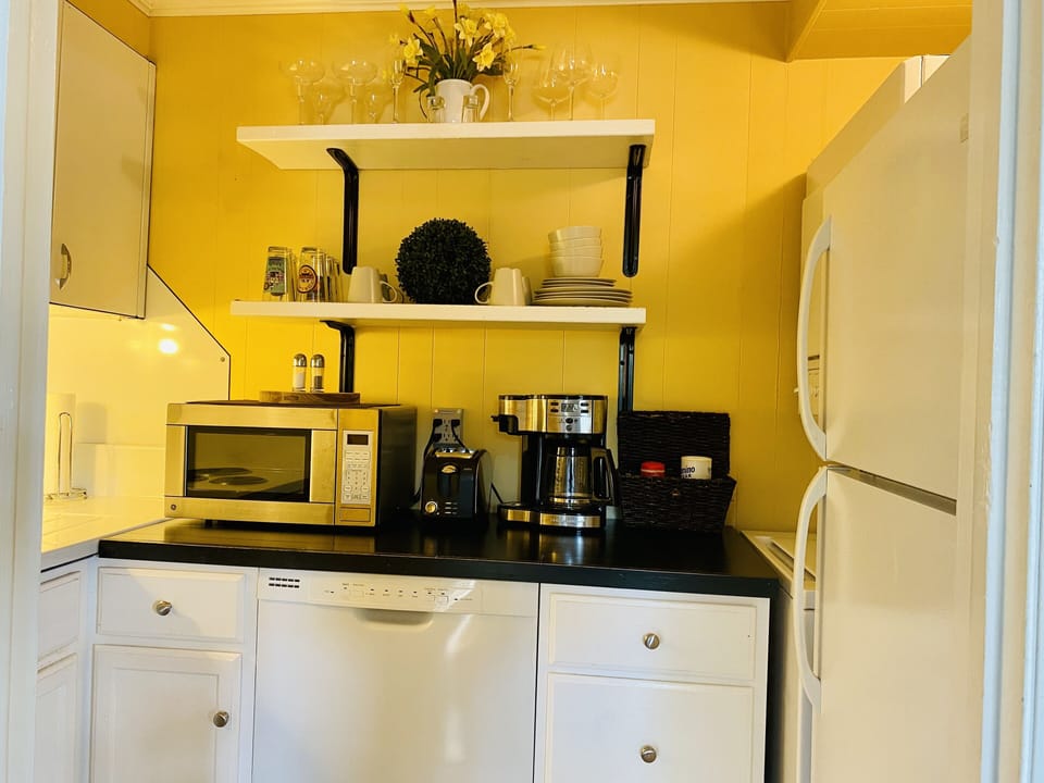 It’s compact nesting…with a full refrigerator and clothes washer & dryer too!
