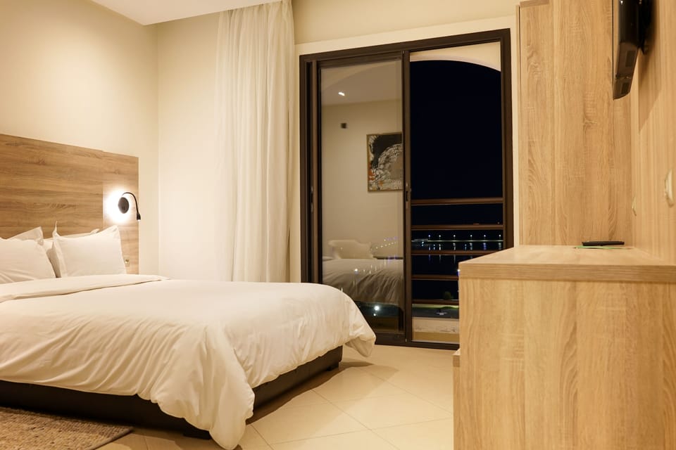 Sea View Double Room | Desk, blackout drapes, free WiFi, bed sheets