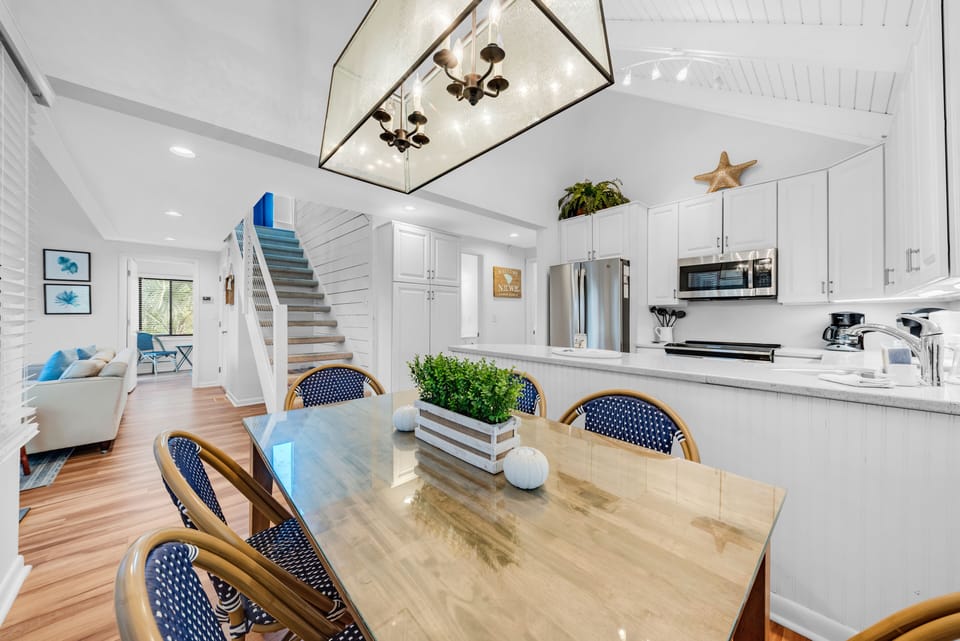The dining area sits between the great room and the kitchen
