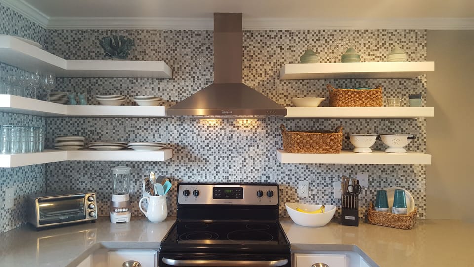 Our kitchen is modern and fully stocked for your convenience.