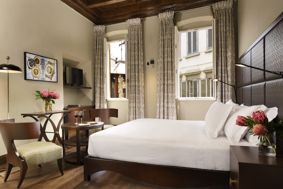 Family Room, 2 Double Beds | In-room safe, individually decorated, soundproofing, iron/ironing board