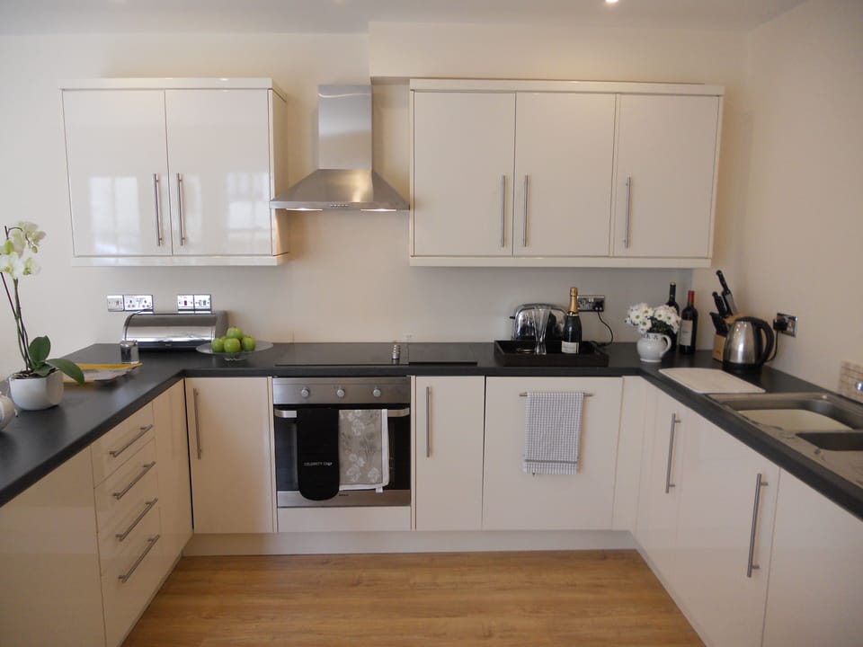 The luxury kitchen is well equipped with  processor and Sophie Conran china

