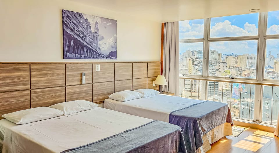 Premium Double or Twin Room | Minibar, in-room safe, blackout drapes, iron/ironing board