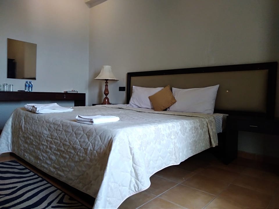 Triple Room, Non Smoking | Down comforters, desk, soundproofing, iron/ironing board