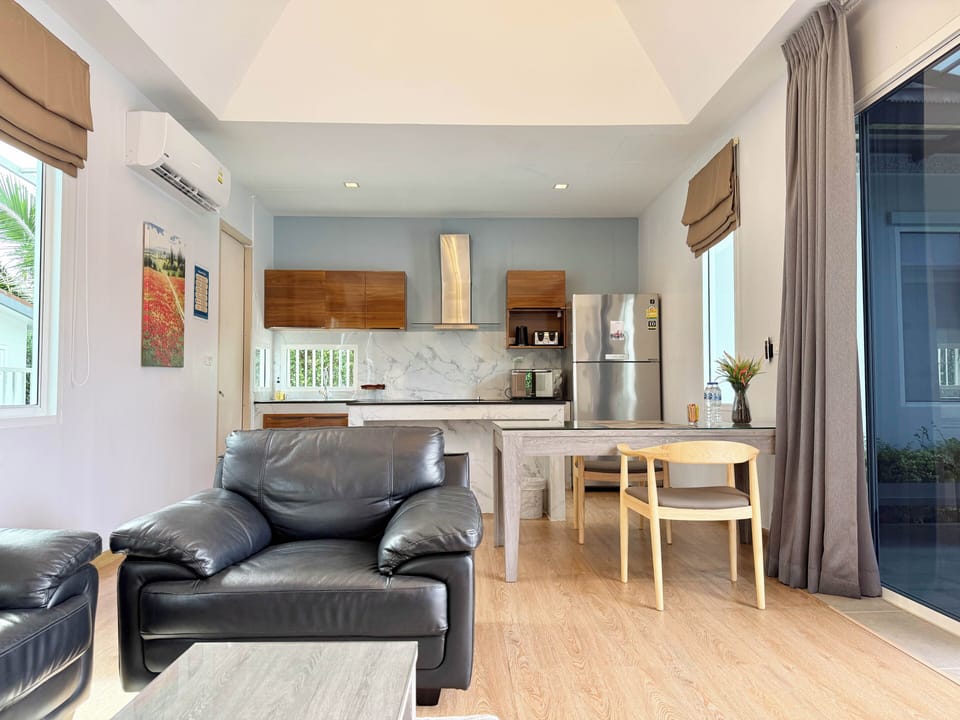 One Bedroom Suite Pool Access | Living area | Flat-screen TV