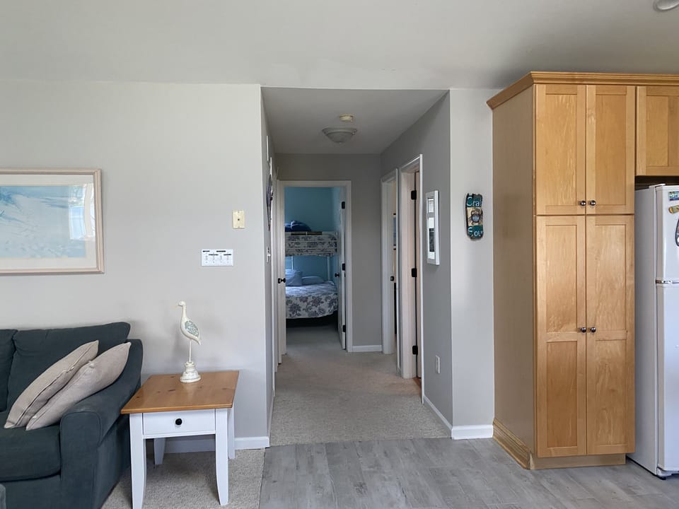 Hallway from main living space to second and third bedrooms