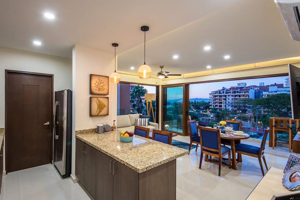 Fully equipped kitchen and nice bar to sit at