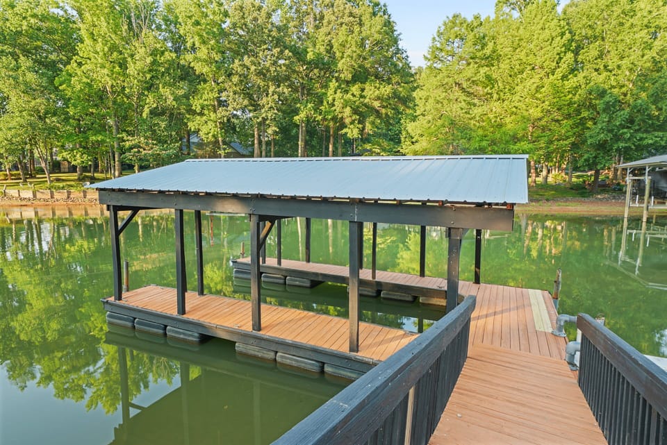 Large dock area at Huckleberry Hideout perfect for your rented boat, swimming or to launch kayaks and paddle boards.