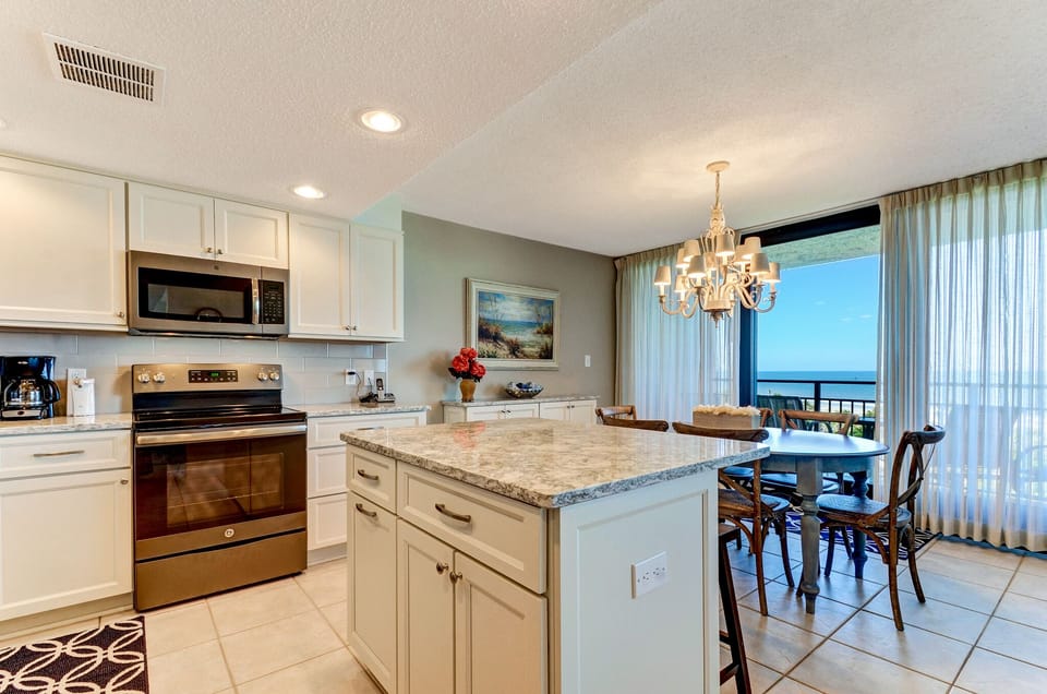 Kitchen with island and stools