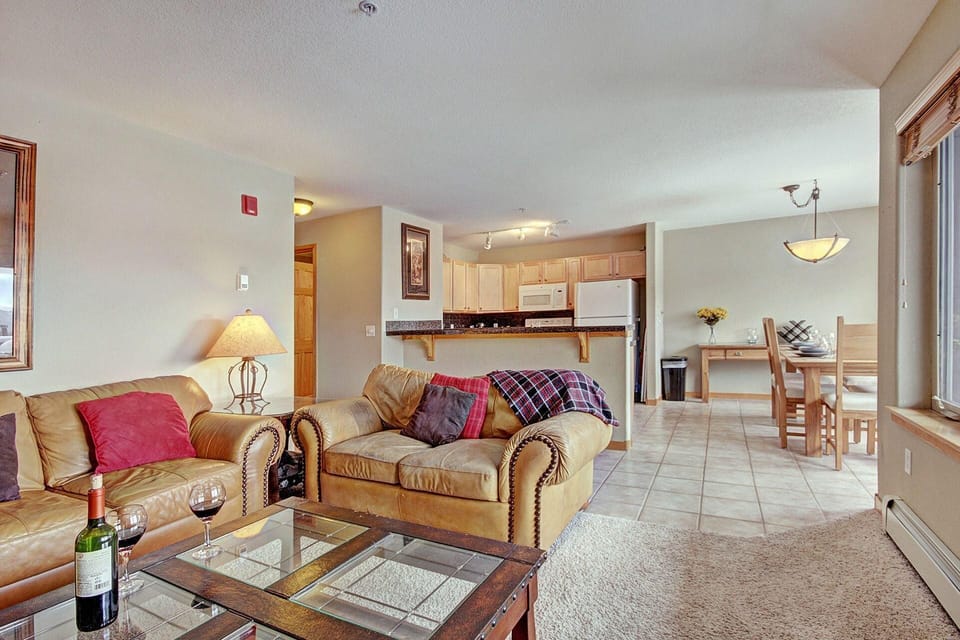 Open concept living and kitchen area, dining area on the right