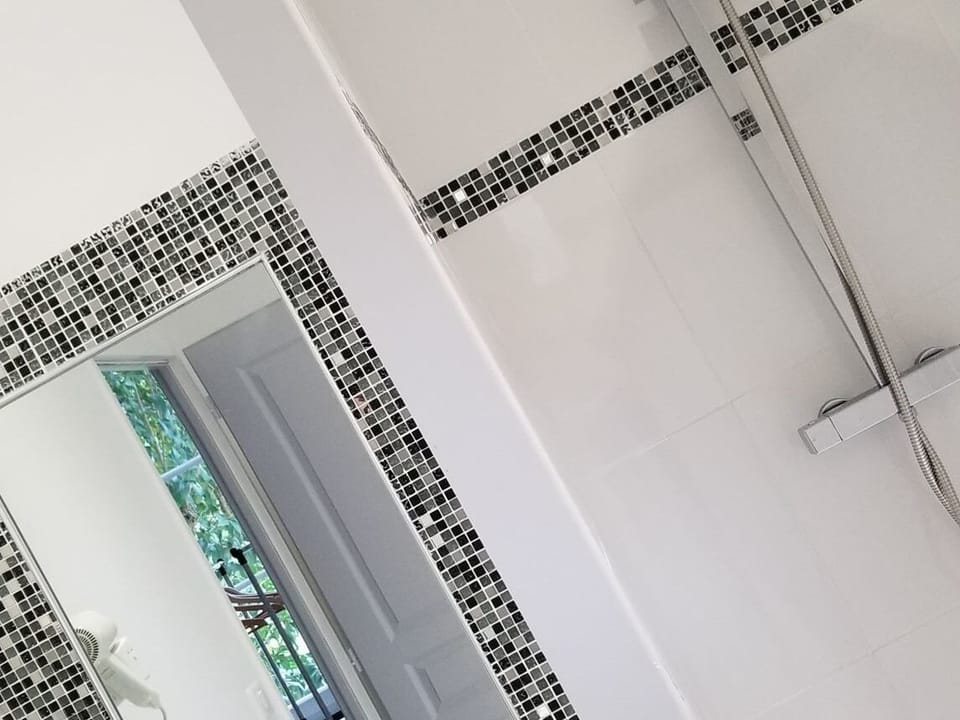 Deep soaking tub, rainfall showerhead, free toiletries, hair dryer