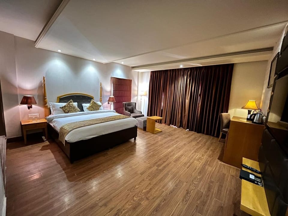 In-room safe, desk, laptop workspace, iron/ironing board
