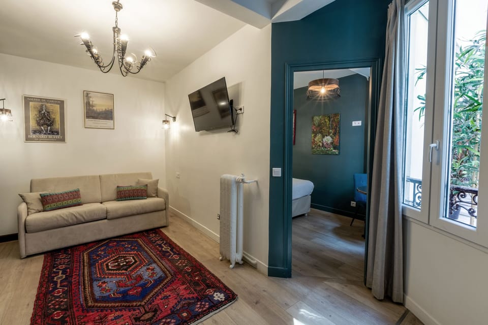 Classic Apartment, 1 Bedroom | Living area | Flat-screen TV