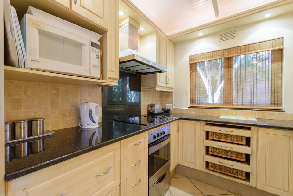Superior Suite, 3 Bedrooms | Private kitchen | Full-size fridge, microwave, oven, stovetop