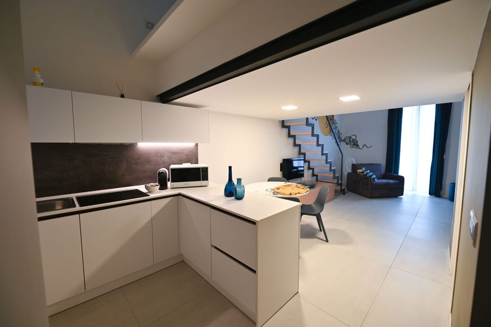 Deluxe Apartment, Balcony | Private kitchen | Fridge, microwave, stovetop, espresso maker