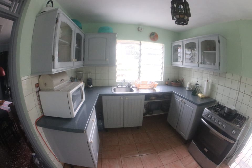 Economy Apartment, 1 Queen Bed, Non Smoking | Private kitchen | Full-size fridge, microwave, oven, stovetop