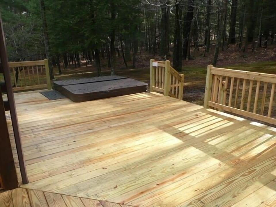 deck with hot tub