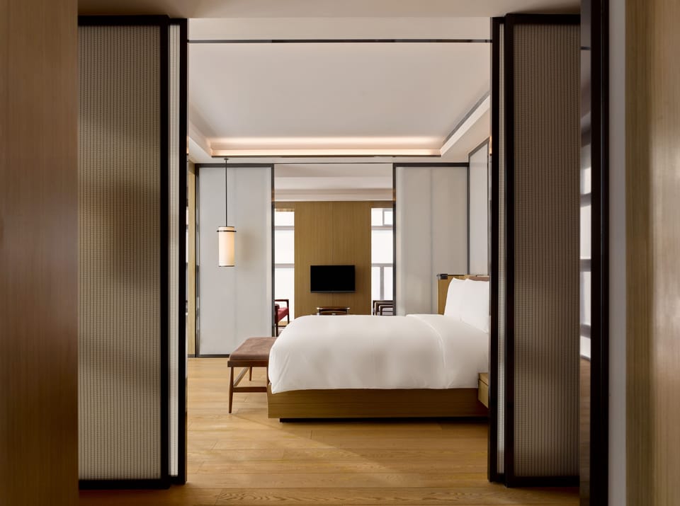 PuXuan Suite | Minibar (free items), in-room safe, blackout drapes, soundproofing