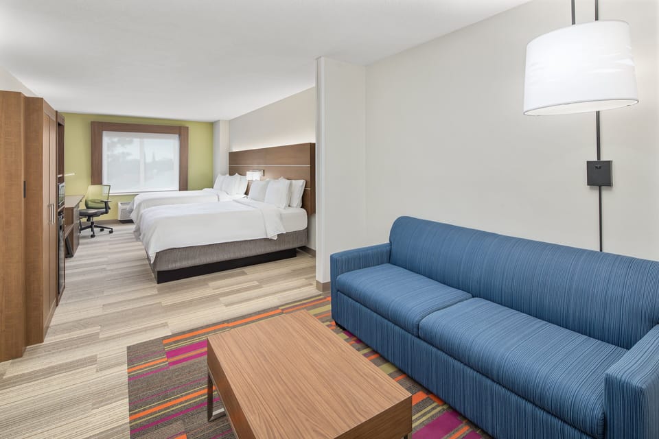 Suite, 2 Queen Beds | In-room safe, desk, laptop workspace, blackout drapes