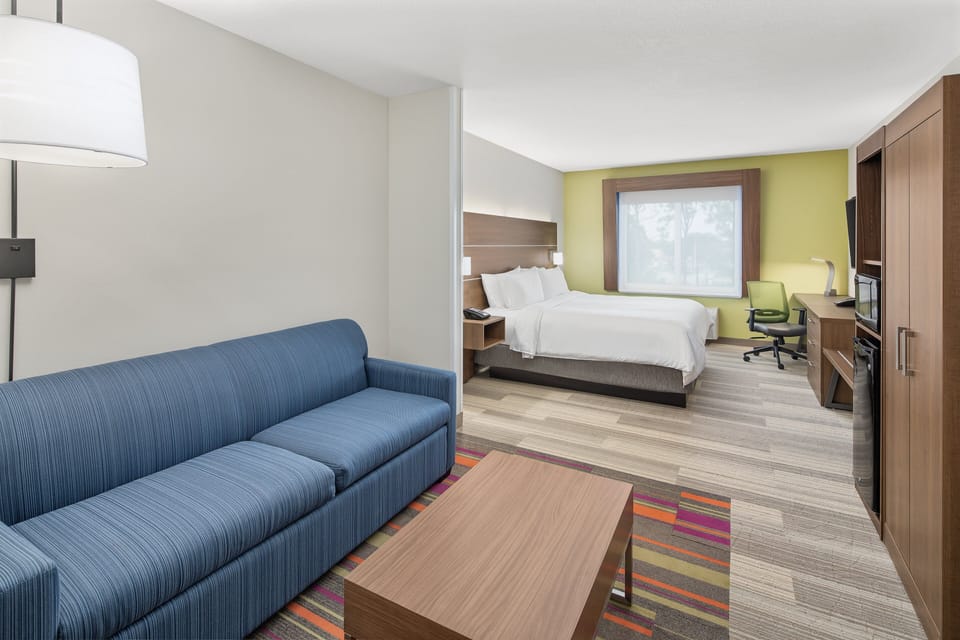 Suite, 1 King Bed with Sofa bed | In-room safe, desk, laptop workspace, blackout drapes