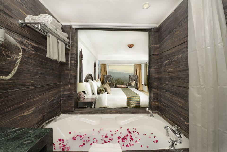 Royal Suite, Bathtub, River View | Bathroom | Designer toiletries, hair dryer, slippers, towels