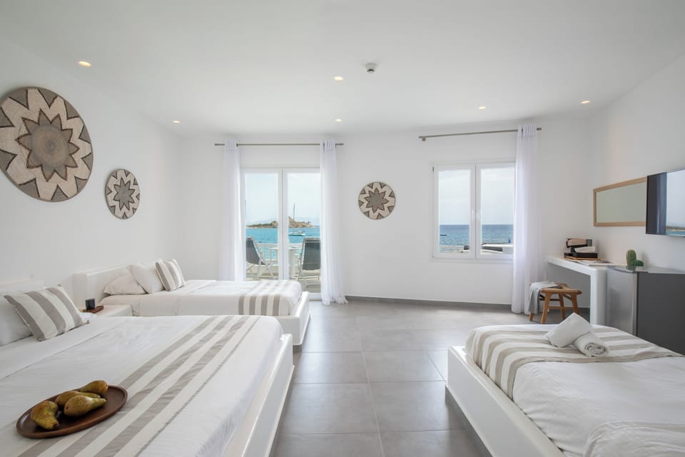 Deluxe Quadruple Room, 1 Bedroom, Sea View, Sea Facing | Premium bedding, in-room safe, desk, laptop workspace