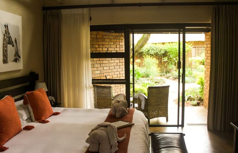Deluxe Room, 1 Bedroom, Ensuite, Garden View | Premium bedding, in-room safe, soundproofing